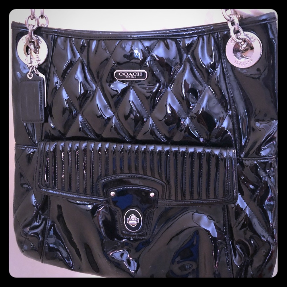 Patent leather black coach bag. Never used.